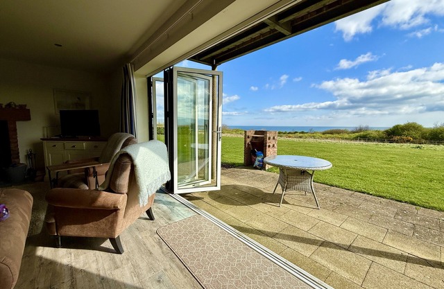 Len's Sandy Collection - 3 Cottages that sleeps 16 guests in 8 bedrooms