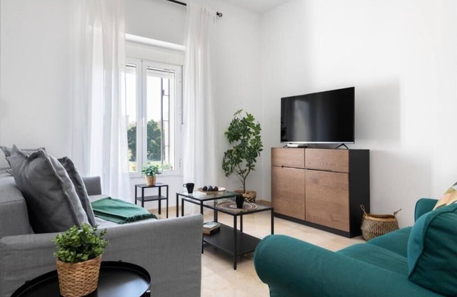 Leones Home, parking and river views.