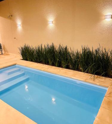 Lindo sobrado central com piscina aquecida