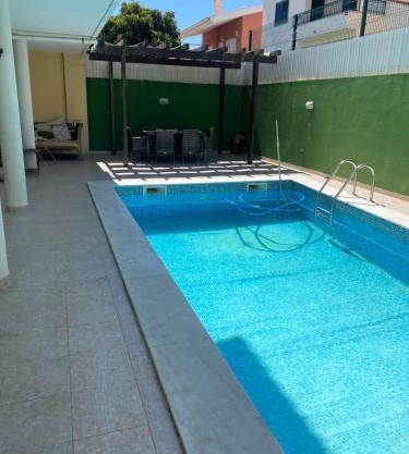 Little double room in a House with pool near the beach