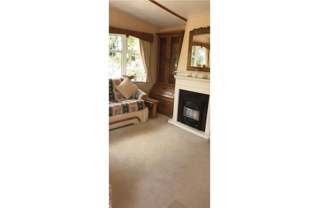Little Malory, a spacious mobile home located on private land