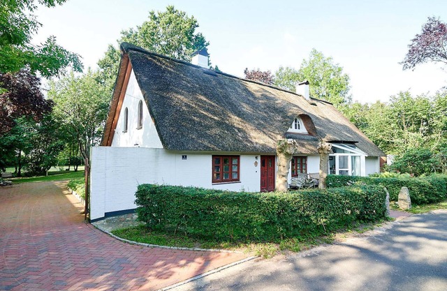 Vivre sous le chaume, dans un jardin de 15 000 m²