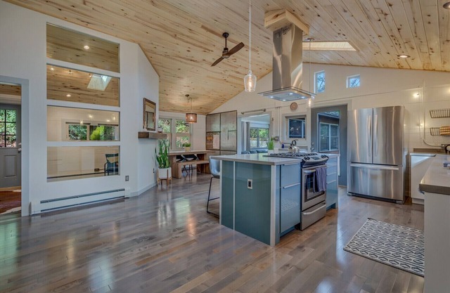 Locally owned modern house with unique path over roaring fork pedestrian bridge