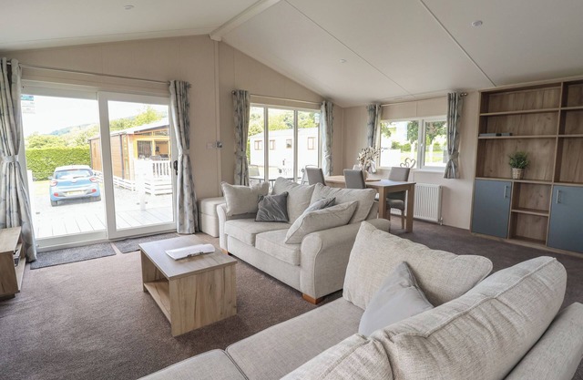 LODGE 3, pet friendly, country holiday cottage, with pool in St Asaph