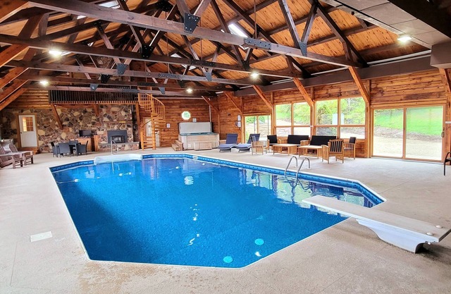 Lodge w/ INDOOR PRIVATE HEATED POOL + Hot Tub + Fire Pit + Pond, on 19 acres
