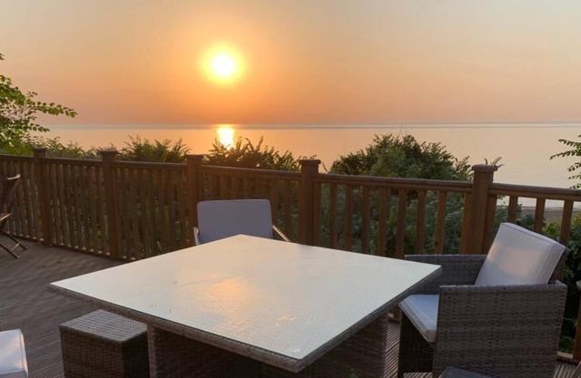 Lodge with decking and sea views at Azure Seas Park in Suffolk ref 32012AS