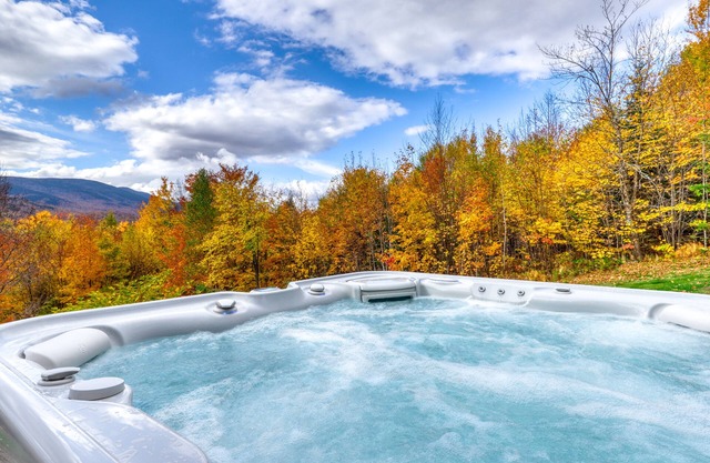 Lodge with Sunday River sunset view, private hot tub, sauna, & deck