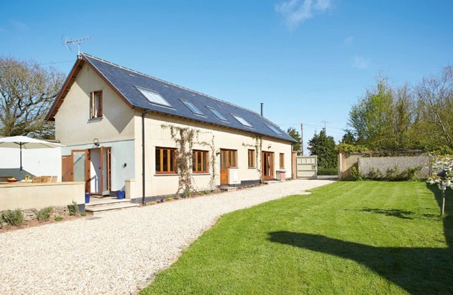 Long Meadow Barn est une charmante grange spacieuse convertie détaché situé dans le village de Saint-bas Marie