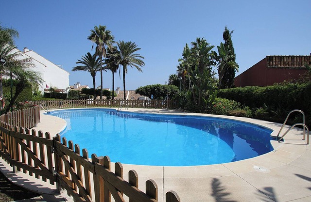 Lovely 3 bedroom townhouse by the beach near Estepona w shared pool and garden