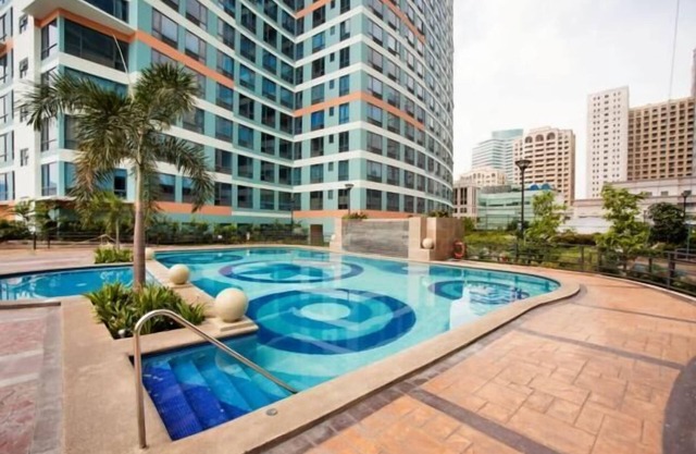 Belle et spacieuse 1BR Eastwood Condo