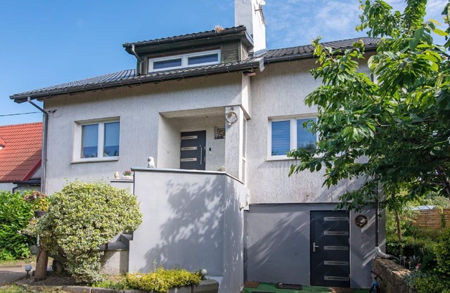 Confortable appartement dans une maison de vacances avec WIFI, TV, patio et animaux admis