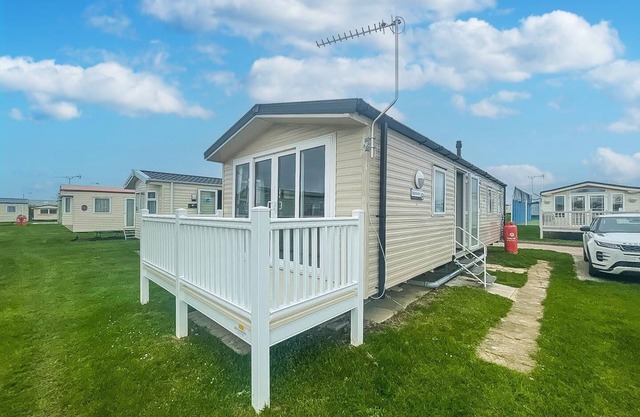 Lovely caravan with decking on California Cliffs Holiday Park ref 50045C