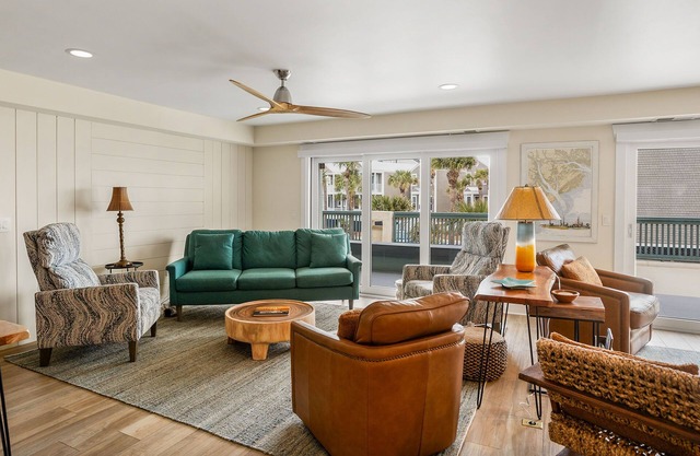 Lovely, Modern First Floor Condo with an OCEAN VIEW! Resort Access Included! Golf Cart Included!