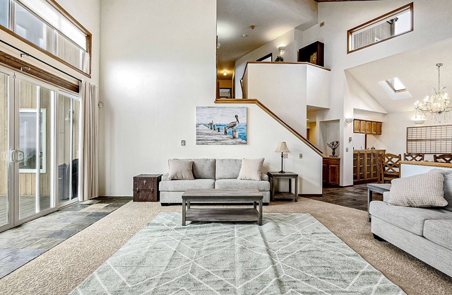 Lovely oceanfront oasis with panoramic views, patio, & games - near beach & golf