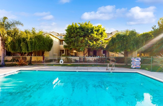 Lovely retreat with pool, hot tub, & balcony - walk to the beach - dog-friendly