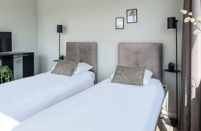 Chambre de luxe avec cuisine partagée