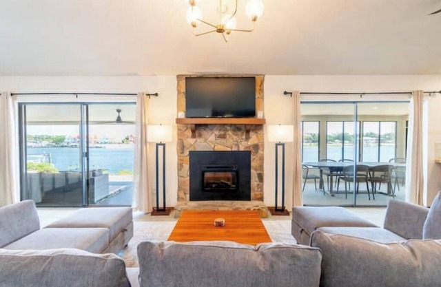 Lux Waterfront Oasis w/ Private Dock, Kayaks, Blackstone Grill, and Fire Pit