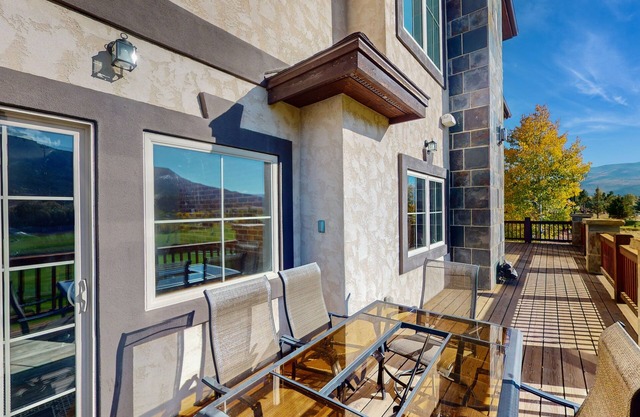 Luxe home on Gypsum Creek Golf Course with fireplace and mountain views