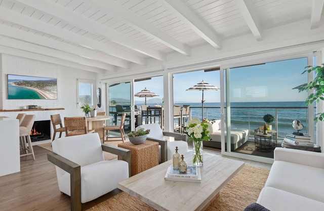 Luxurious Upper Beachfront Bliss with Balcony and Unobstructed Ocean Views!