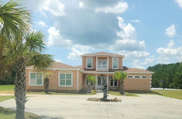 Luxurious 7-bedroom Estate with Movie Theatre, Pool, and Basketball Court