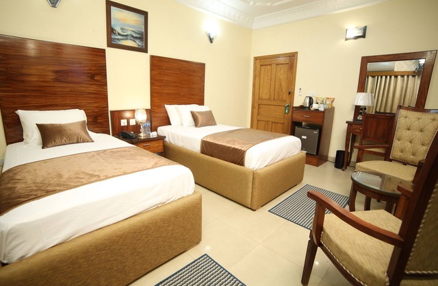 Luxurious Deluxe Twin Room, Fully Furnished with 2 Single Beds.