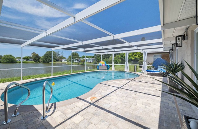 Luxury 3BR Home w/ Heated Pool, Outdoor TV, Bikes & BBQ – Perfect for Families with Modern Kitchen!