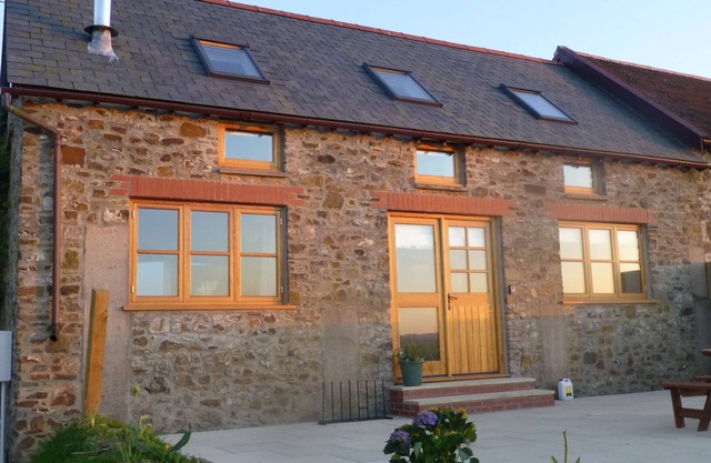 Conversion de grange de luxe au coeur du North Devon dans une petite propriété de 11 acres