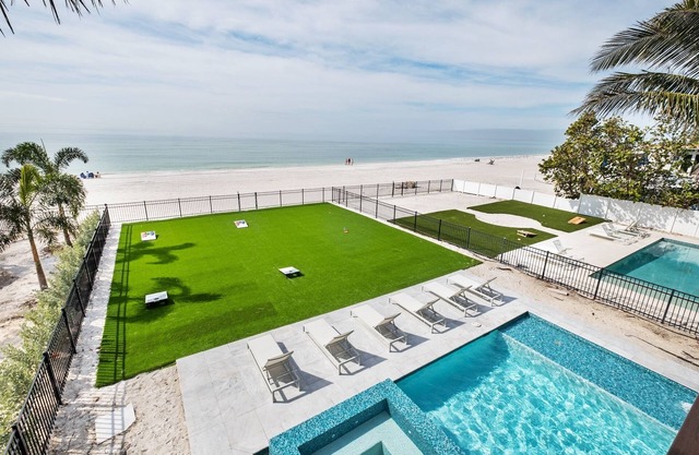 Beachfront Paradise - Huit Chambres Maison, Couchages 18