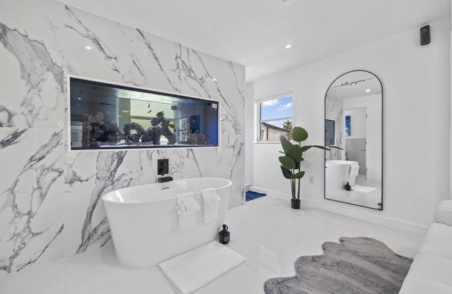 Luxury family friendly WATERFRONT home with a POOL, PLAYGROUND, FIREPIT & BEACH