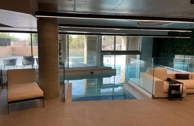 Flat indoor pool gym view of Wembley stadium