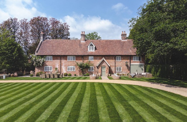 Luxury home in the New Forest featuring a year-round heated swimming pool.