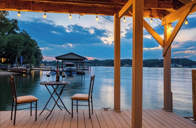 Luxury Lakefront Retreat with Game Room, Private Beach, Dock and Paddle Boards!