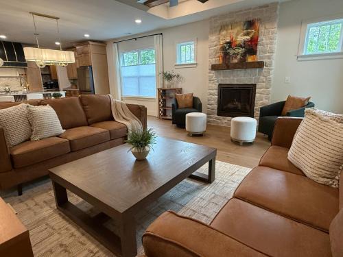 Luxury New Construction Cottage with fireplace, office, and covered deck