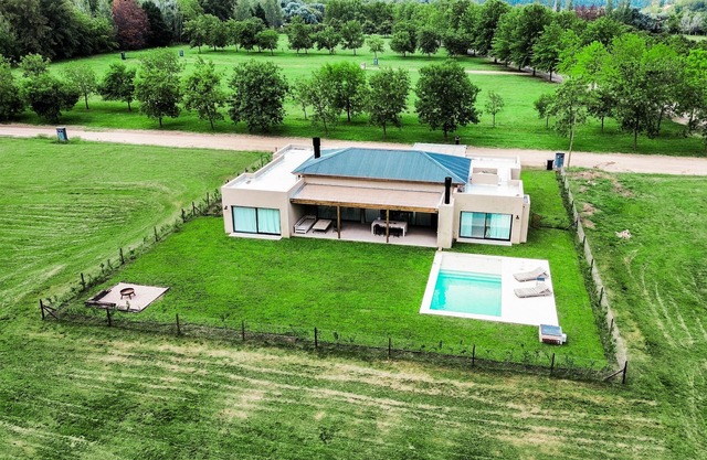 Luxury retreat: Modern house with garden and pool
