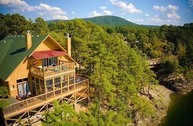 Magnificent Four Bedroom, Two 1/2 Bath luxury, log-sided Harbor North cottage with incredible views of Lake Ouachita. by RedAwning