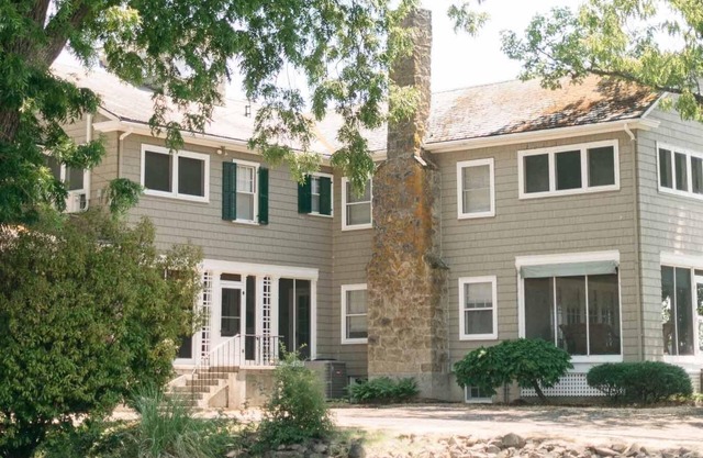 Main Residence: 5 beds, 5 baths, sleeping porches, & full kitchen.