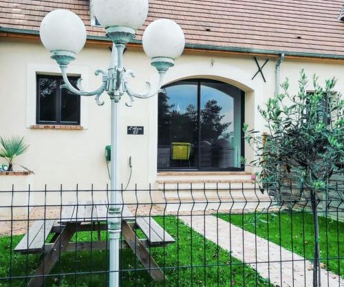 Maison de charme à Sainte-Geneviève-lès-Gasny avec jardin paisible
