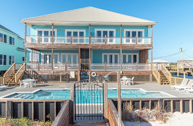Margarittaville East. Professionally decorated, Gulf front 6 BR 4.5 BA unit with a pool