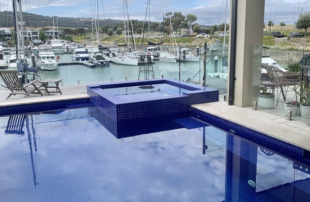 Marina-side Home with Pool and spa for magical Family Holiday. Sleeps 11