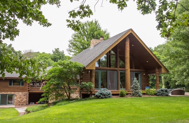Secluded Executive Log Cabin Lodge with 68 ft Pool on 102 acres