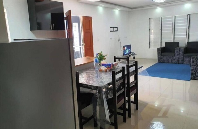 Master Bedroom with shared kitchen and living room