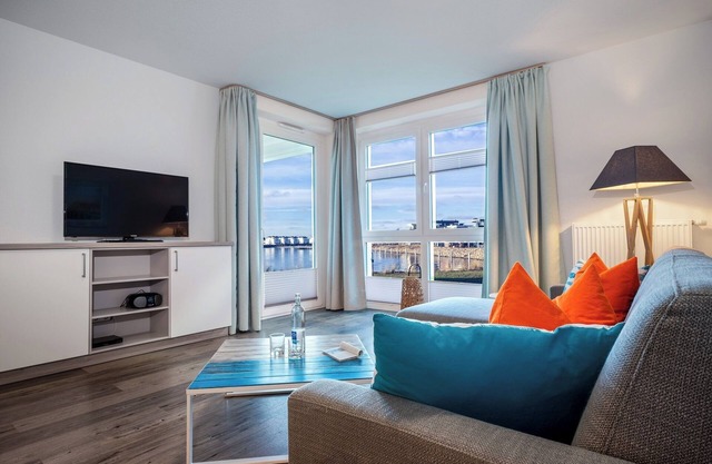 Meereskieker - 1st row on the water, terrace, shower, TV, underground parking space