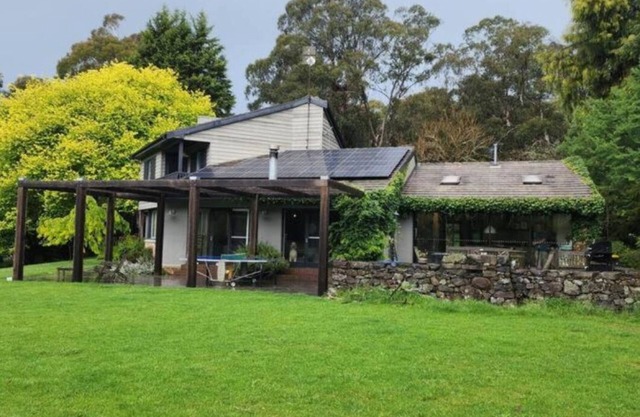 Mid century farmhouse located in the heart of Exeter Village.