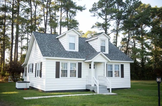 Mid-century modern meets classic cape on the coast.