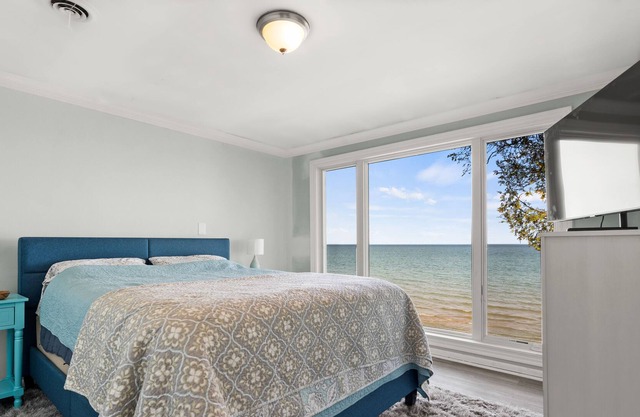 Luxurious LakeFront Home w Incredible Views & Outdoor Space!