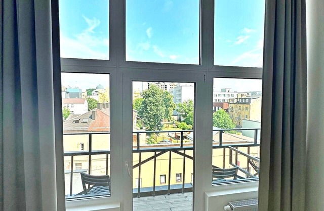 Mini Loft 1 BD Apt by Hostlovers