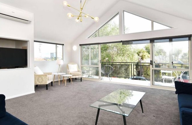Brook Haven - Sleek Modern Home in Graceful Gardens with Flowing Creek