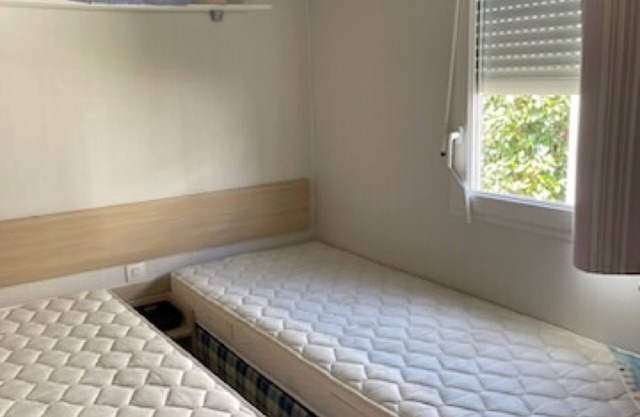 Mobil-home 'Mobil-home Kapa - Proche Mer' avec piscine partagée, terrasse privée et jardin privé