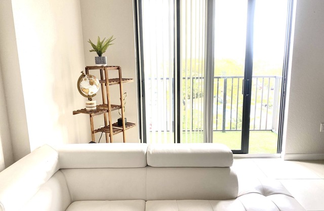 Modern 2 BR condo with downtown and city views