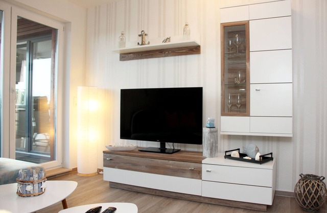 Appartement moderne de construction récente avec grande loggia et salle de bain spacieuse